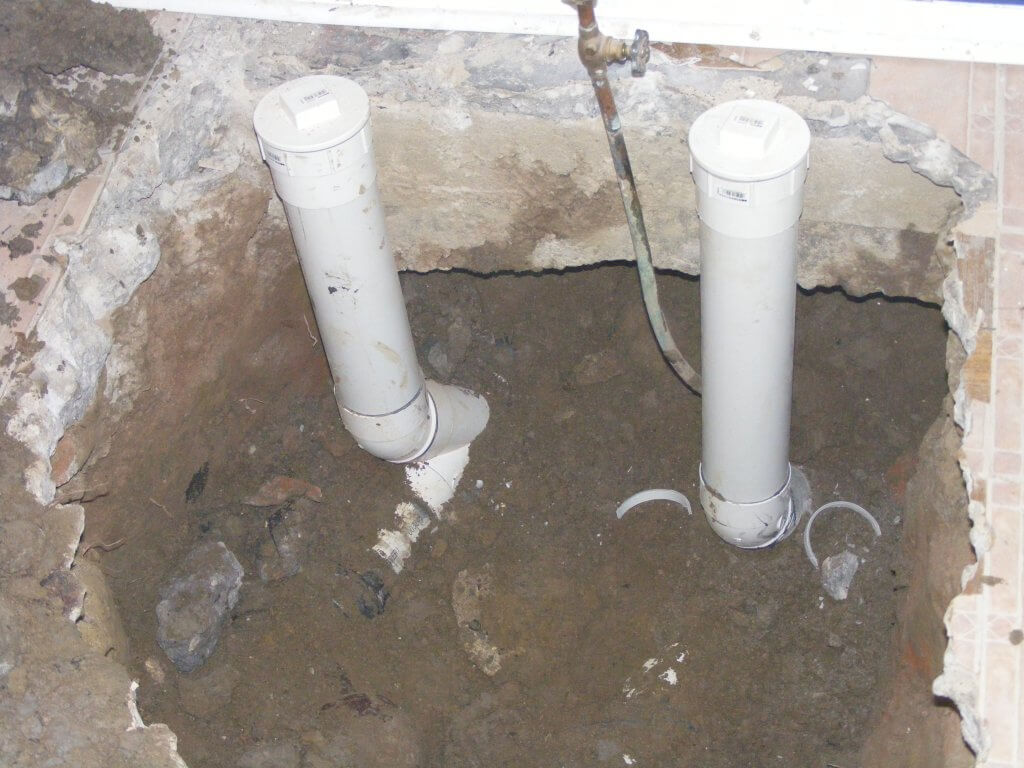 replacement old broken building traps with new PVC pipe and clean-outs