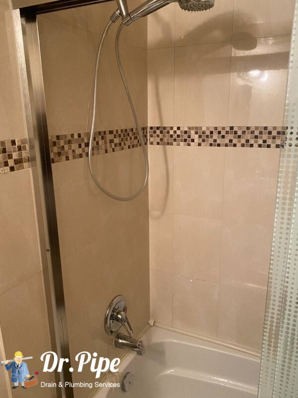 bathroom renovation, new shower faucet installation