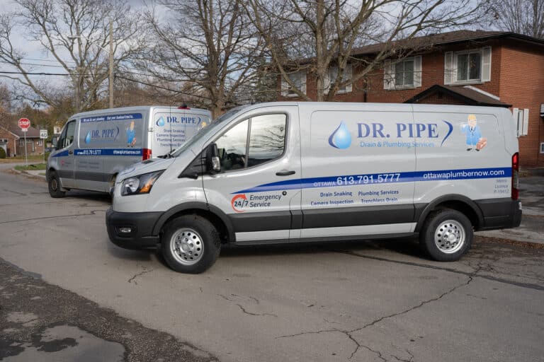 Dr. Pipe technician in front of a service van for plumbing rebates in Ottawa