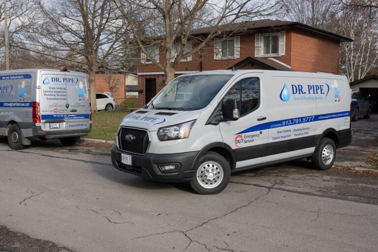 Dr. Pipe service vans for toilet clog repair in Ottawa